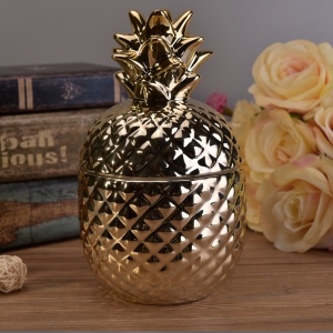 Varm säljande nyanlända handgjord keramisk ljusburk i guld med lock