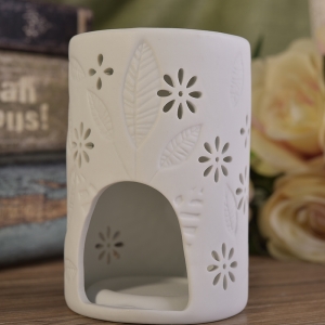 Queimador de vela de cerâmica gravado com folhas brancas