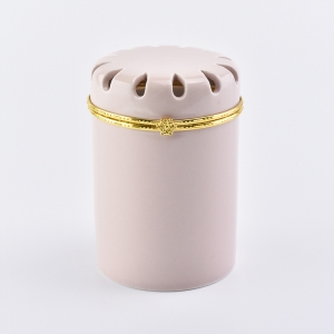 Tarro de vela de cerámica con tapa decorativa