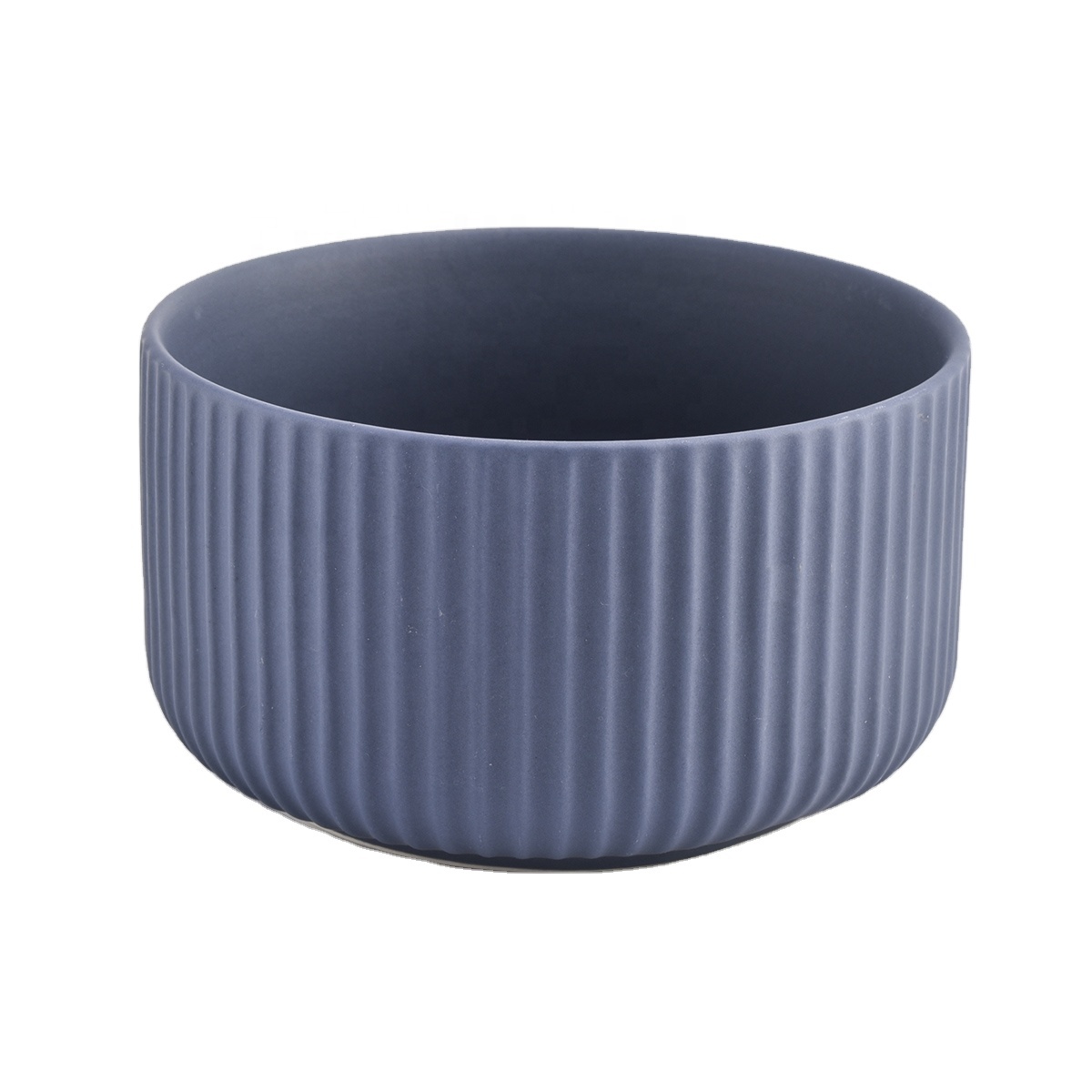 matte blue ceramic candle container with lines