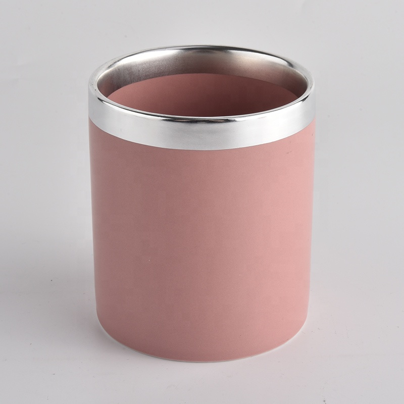 pink colored ceramic candle jars with silver rim