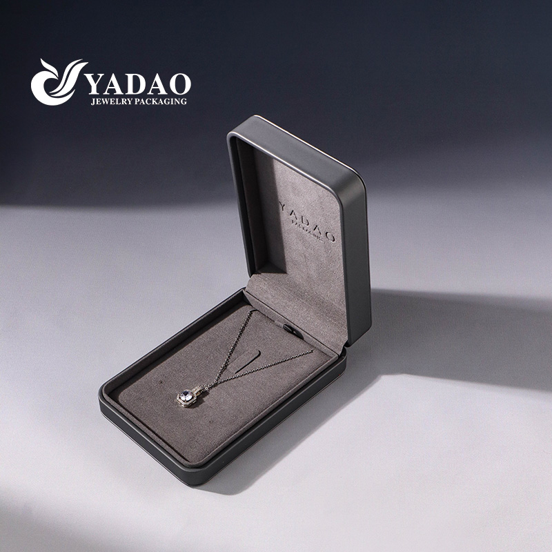 Personalizar la joyería de calidad Caja de empaquetado de plástico de cuero gris PU