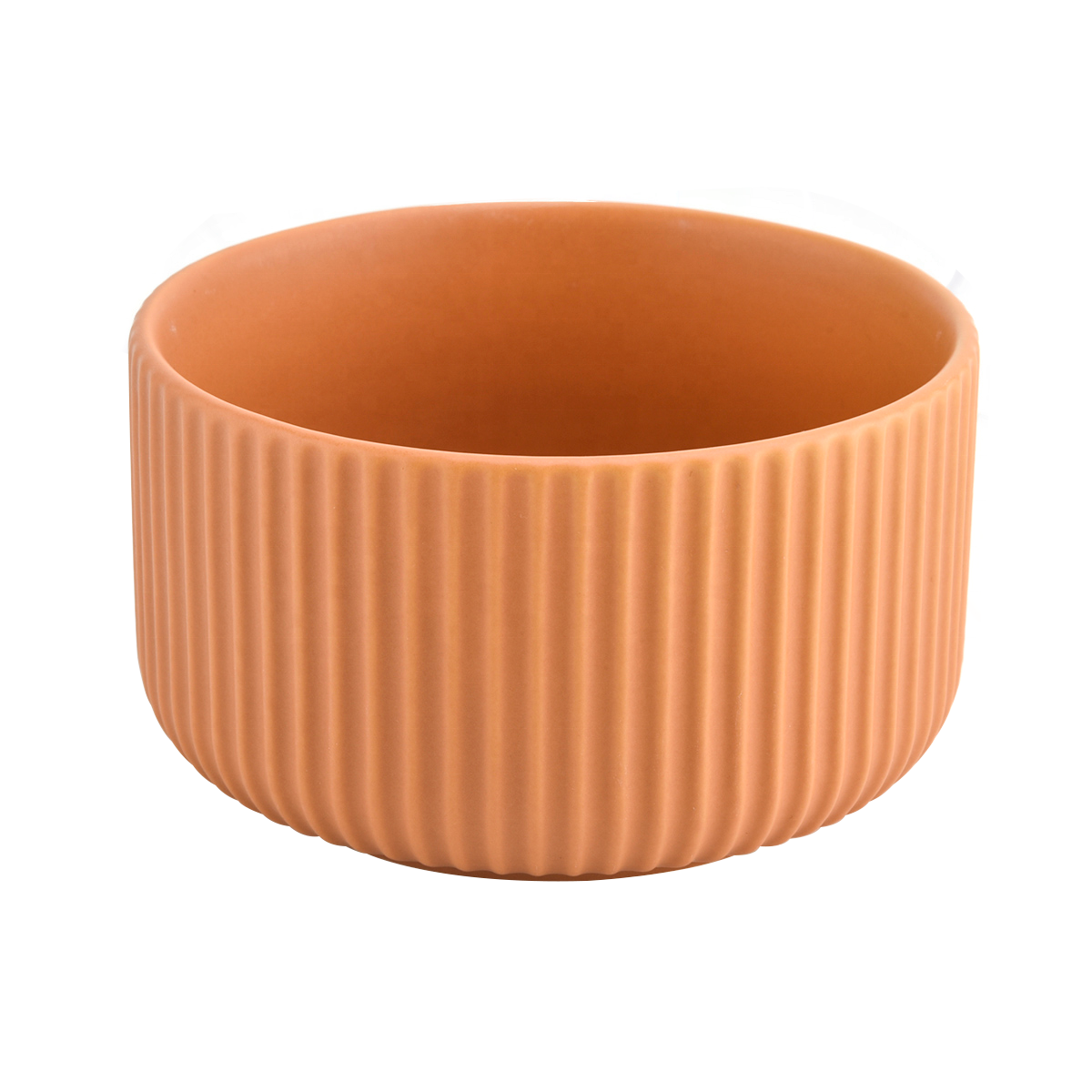 peach glazed ceramic candle vessels with stripe designs