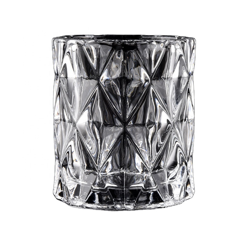 high white glass candle jars with cut geo designs