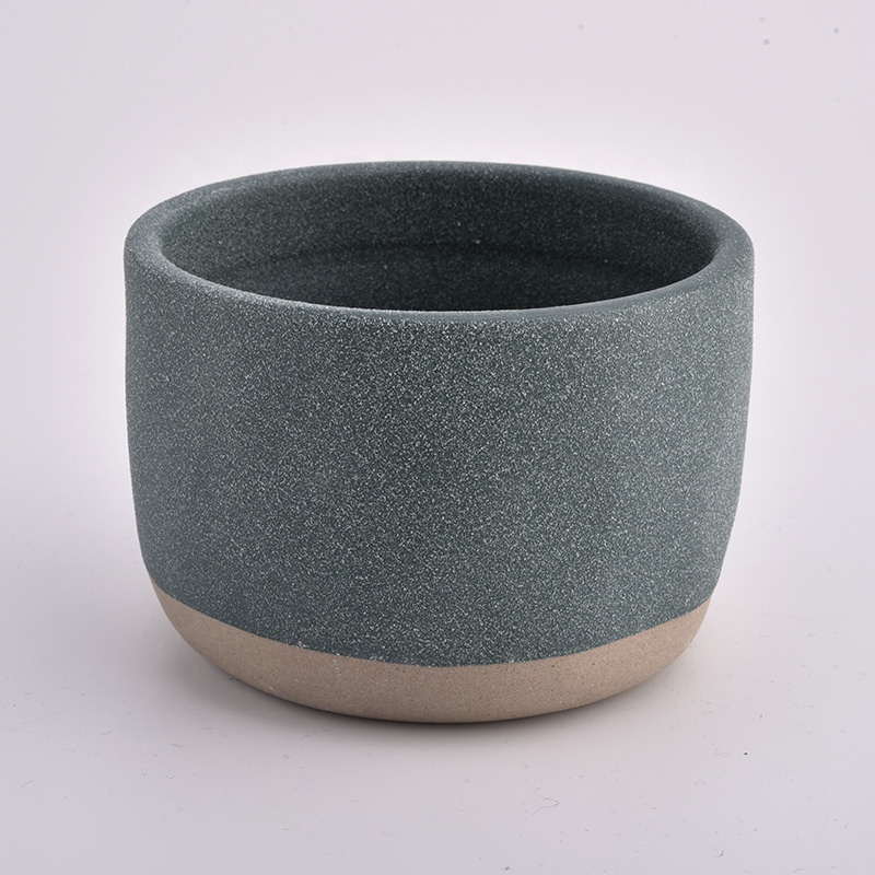 ceramic candle vessels with rough stone finish