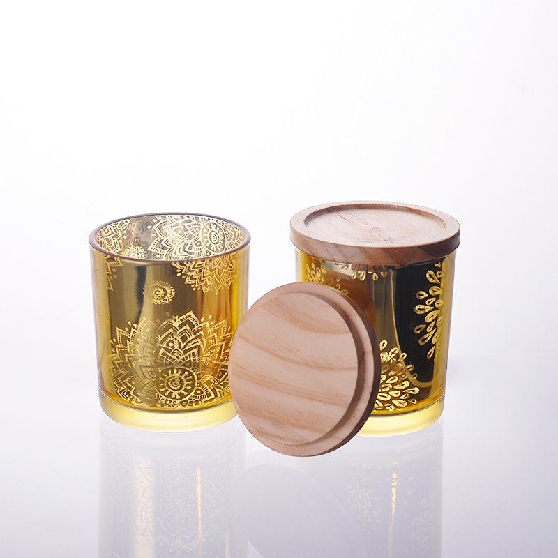 Luxury laser pattern glass candle jar with wooden lids supplier