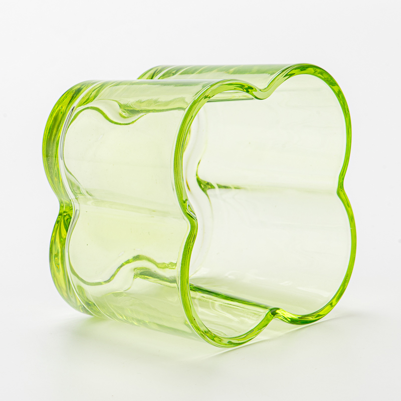 Popular green color glass candle vessel with flower design