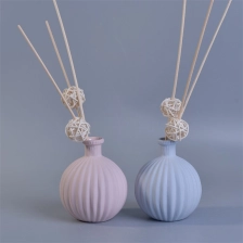 China ceramic 250ml luxury aroma oil empty reed diffuser glass bottle flower reeds for home wedding party manufacturer