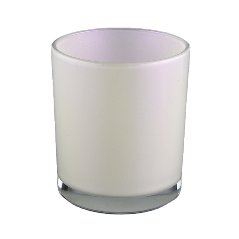 white iridescent candle holder with spraying color inside