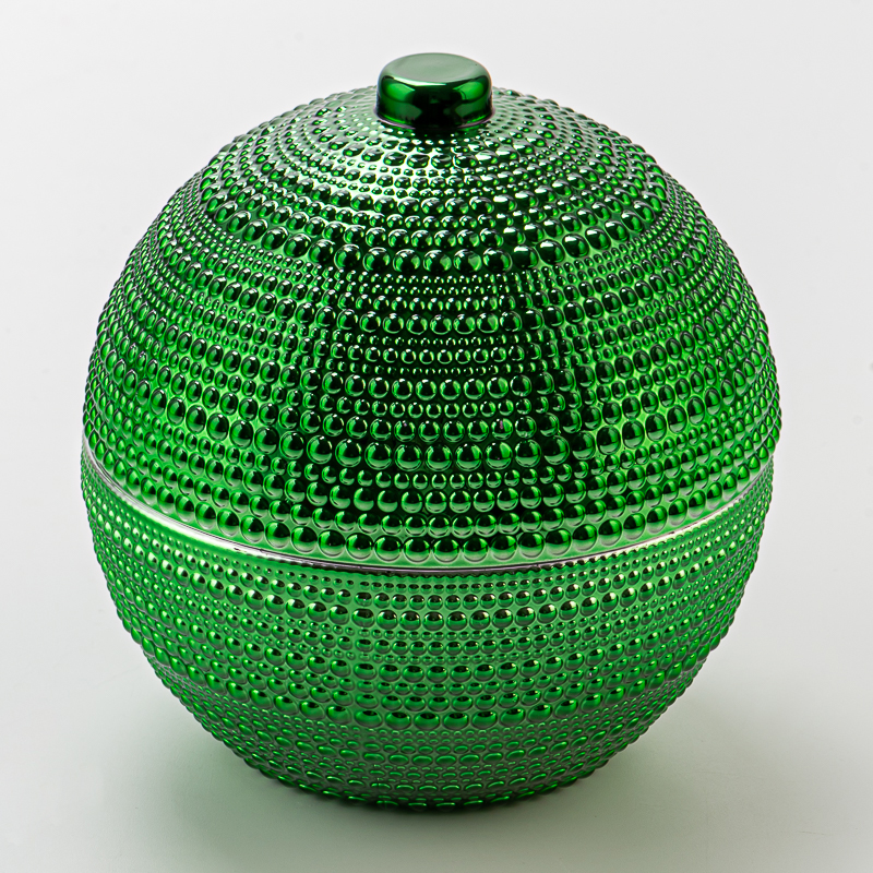 Luxusgrün geprägter Ballformglaskerzenglas mit Deckel Dekorationskerzenhalter