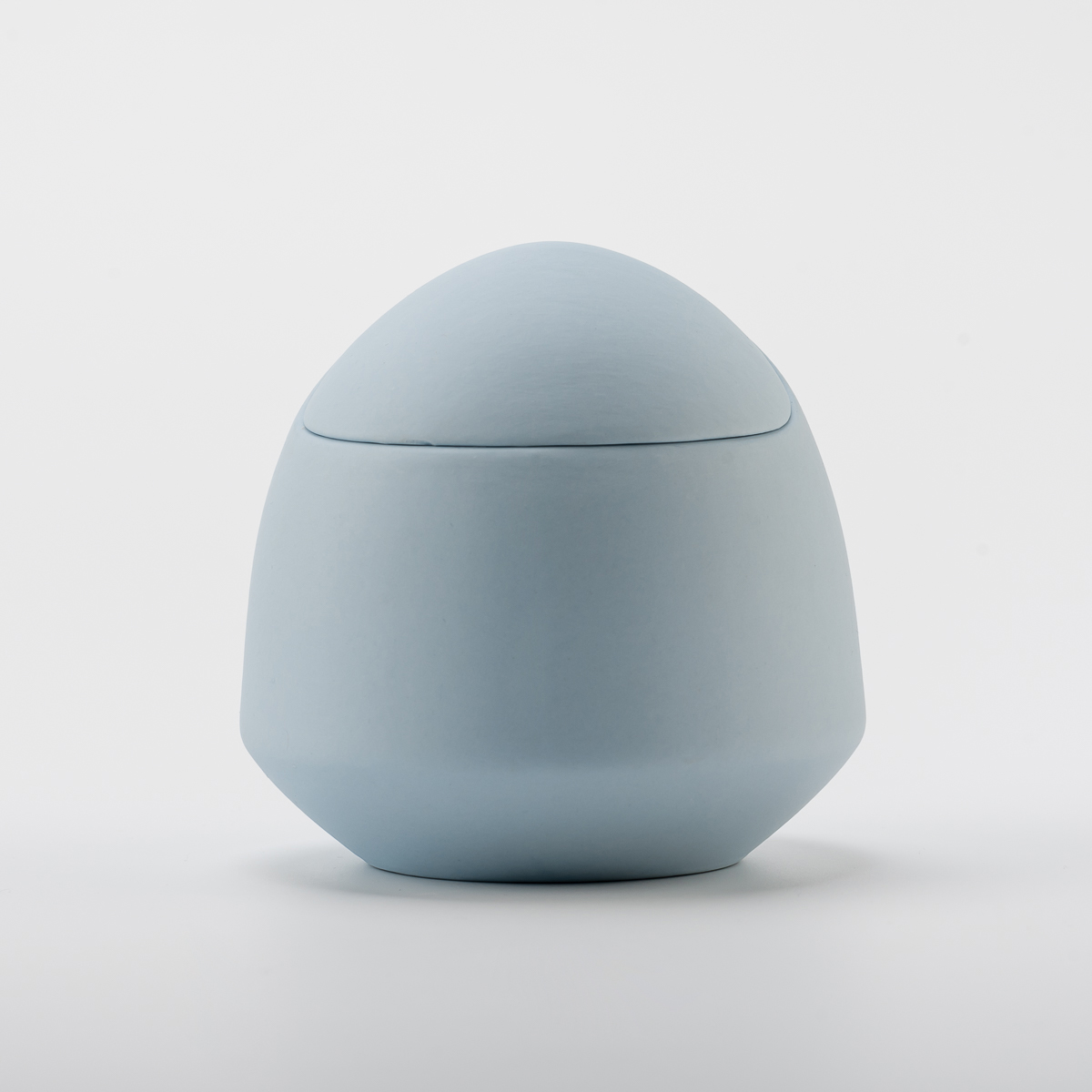 Egg shape ceramic candle jar with home decor