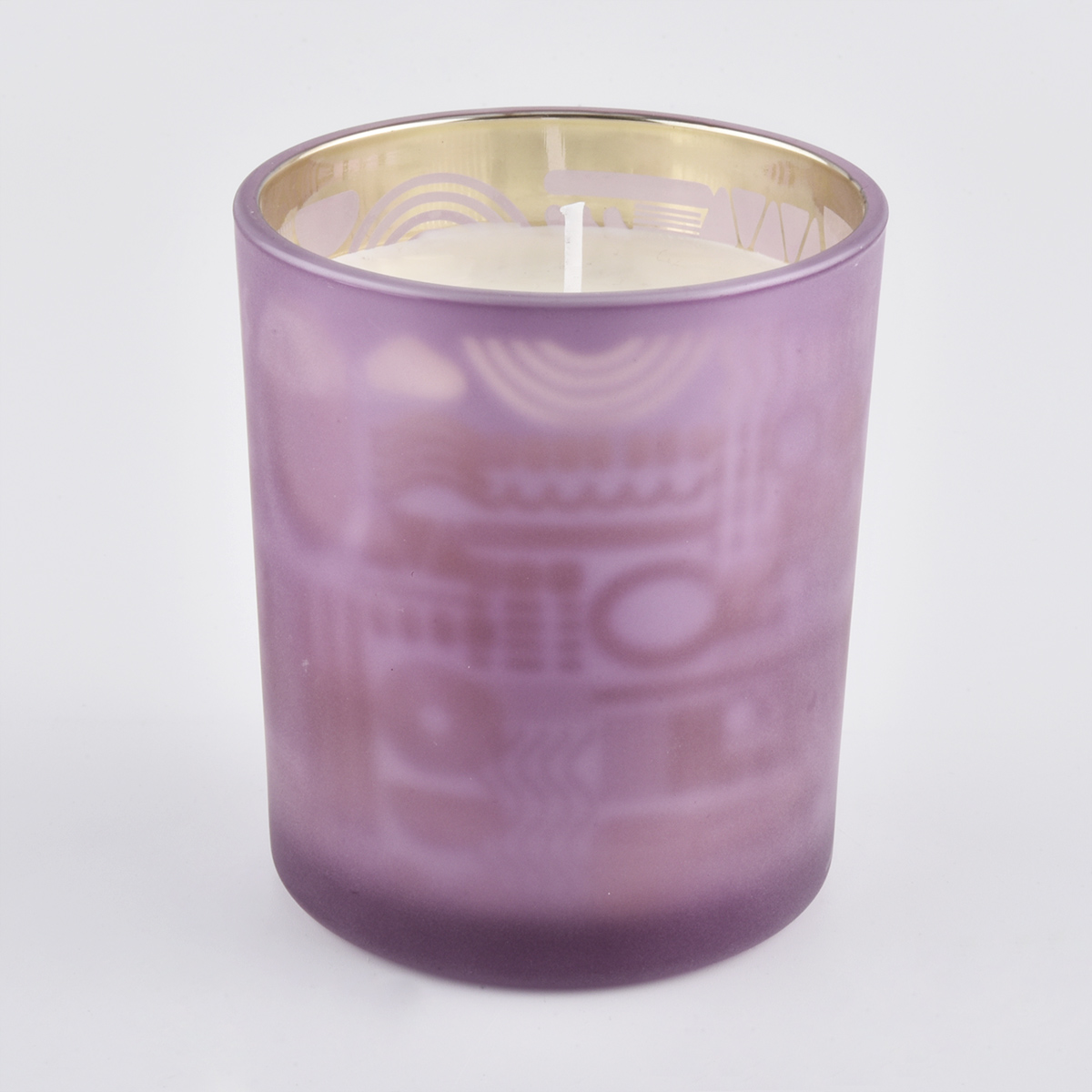 Frosted colored glass candle vessels na may laser pattern.