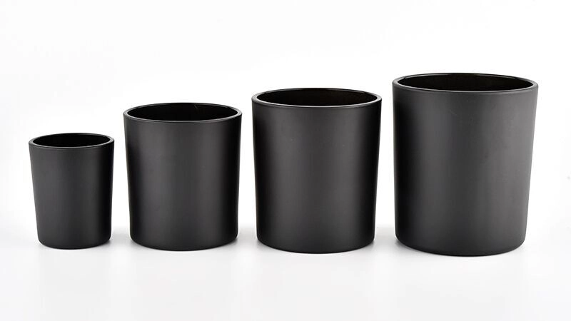 different sizes black glass candle jars with wooden lid