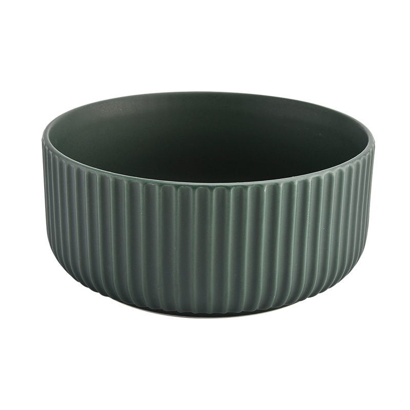 dark green ceramic candle vessels
