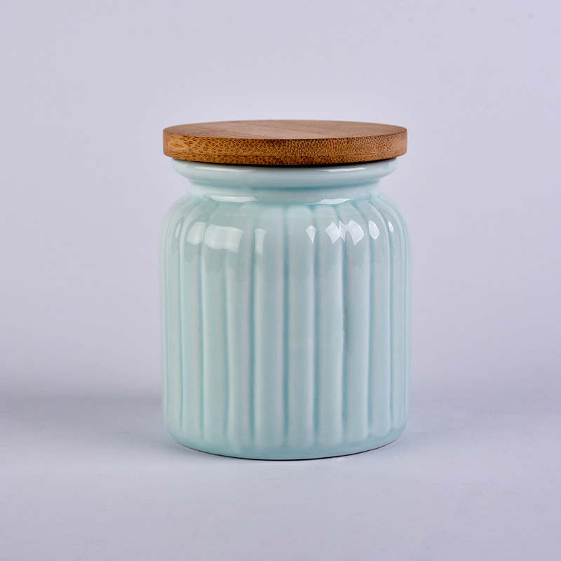 recipiente para velas de cerámica azul con tapa de bambú