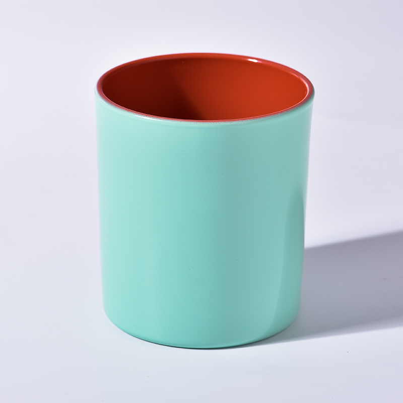 spraying color 8oz glass candle jars and lids with candle holders