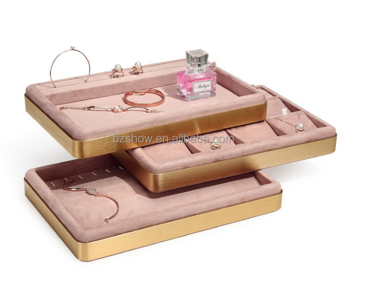 Présentoir d'accessoires de bijoux en métal rose recouvert de daim, personnalisation du marché populaire
