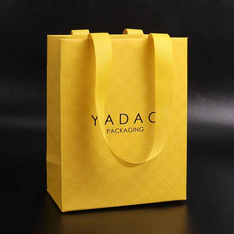 Fancy-stijl boetiekwinkelaccessoire geschenkverpakking papieren lintzak