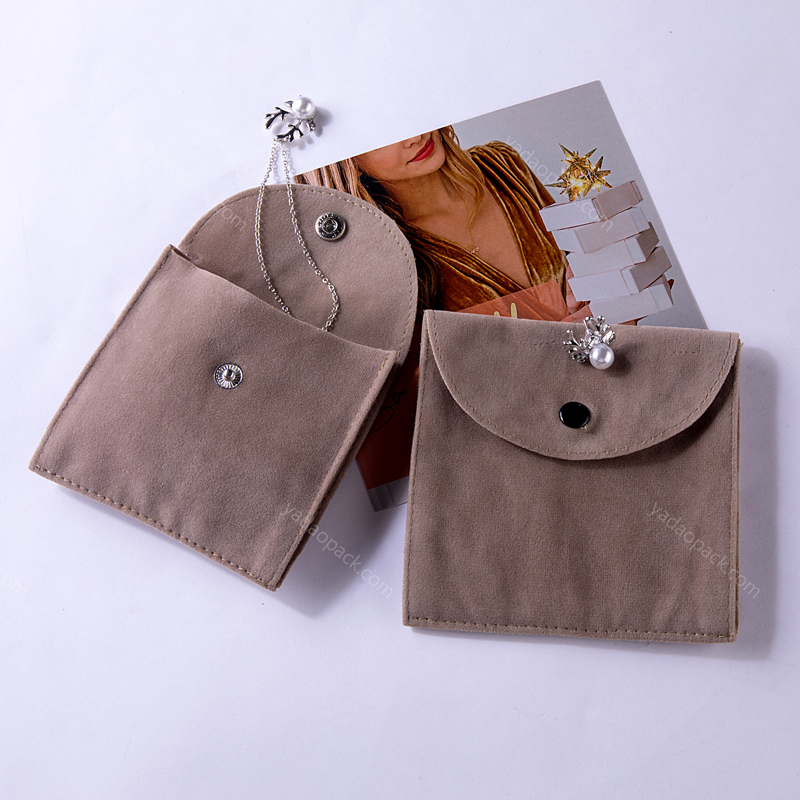 Suede Pouch in brown color with snap closure