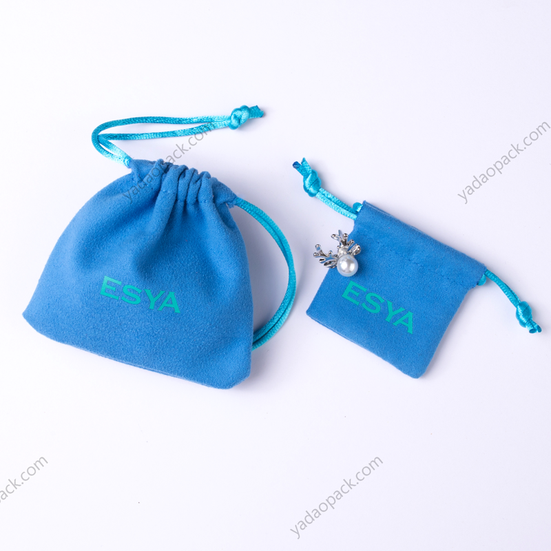 Blue suede pouch with drawstring closure
