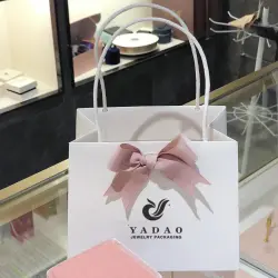 China Yadao shopping paper bag with paper rope handle manufacturer