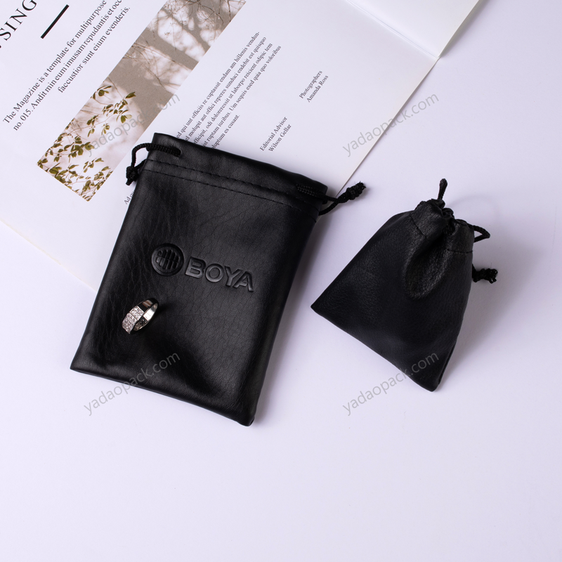 Black leatherette pouch with drawstring closure