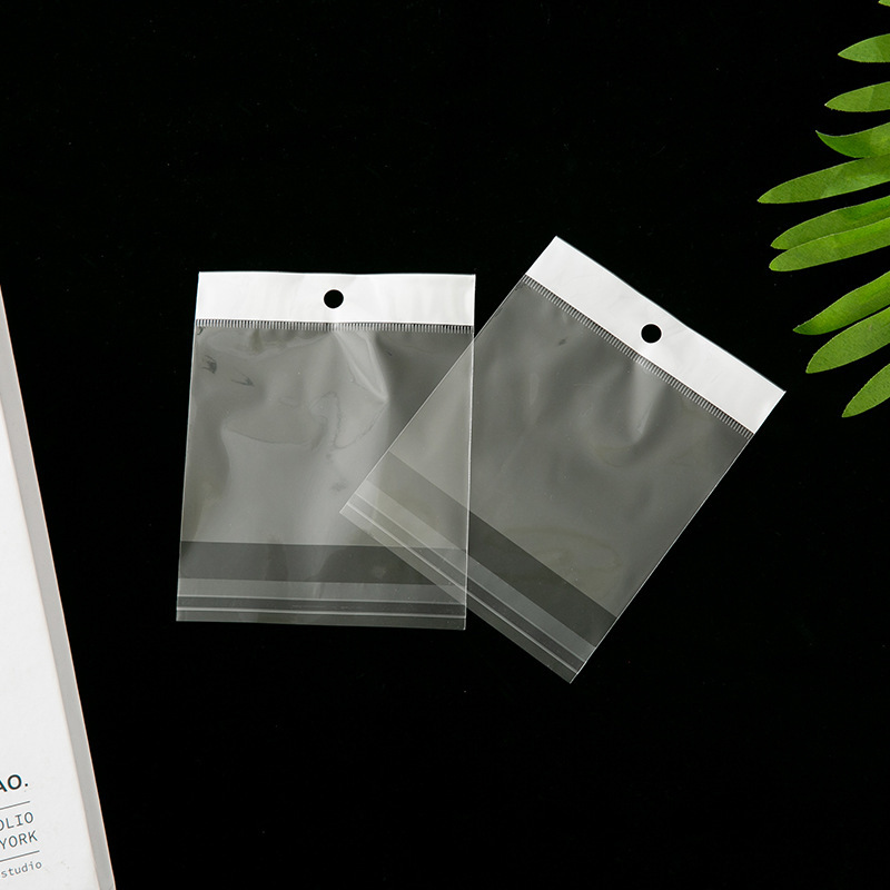 Opp Clear Plastic Self Adhesive Bag Hanging Hole Wearing Nail Halloween Jewelry Strip Card Head Aircraft Packaging