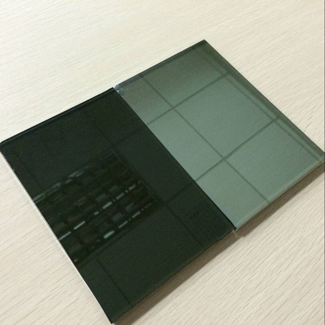 China 6mm dark grey reflective glass supplier,6mm black reflective glass price