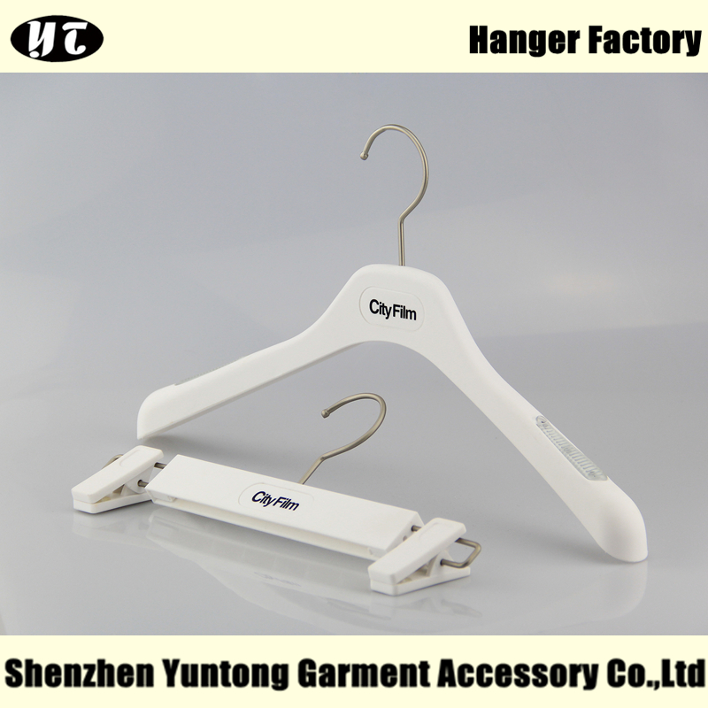 White rubberized plastic clothes hanger for shirt and coat