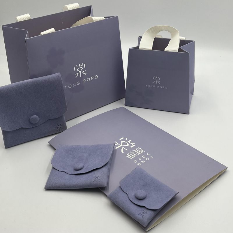 Raio de papel de design suave Presente bolsa de embalagem manuseio de corda bolsa de papel para compras