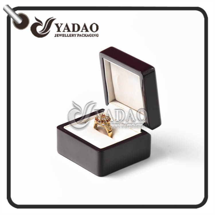 Custom made shiny finish wooden ring box with a slot to put the ring made in Yadao.