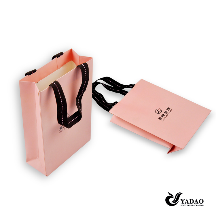 Forme el bolso de empaquetado de la joyería de color rosa con el logotipo de impresión para ir de compras China fabricante