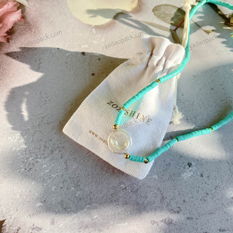 perla gioielli naturali imballaggio beige bianco sporco tela di lino coulisse borsa sacchetto