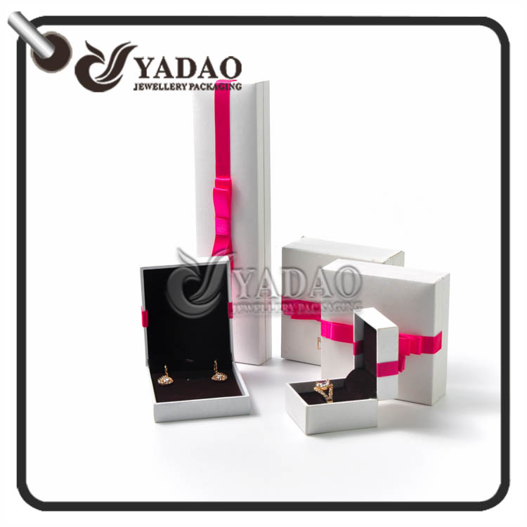 Plastic box set covered with high end matt pu paper decorated with colorful bowknot.