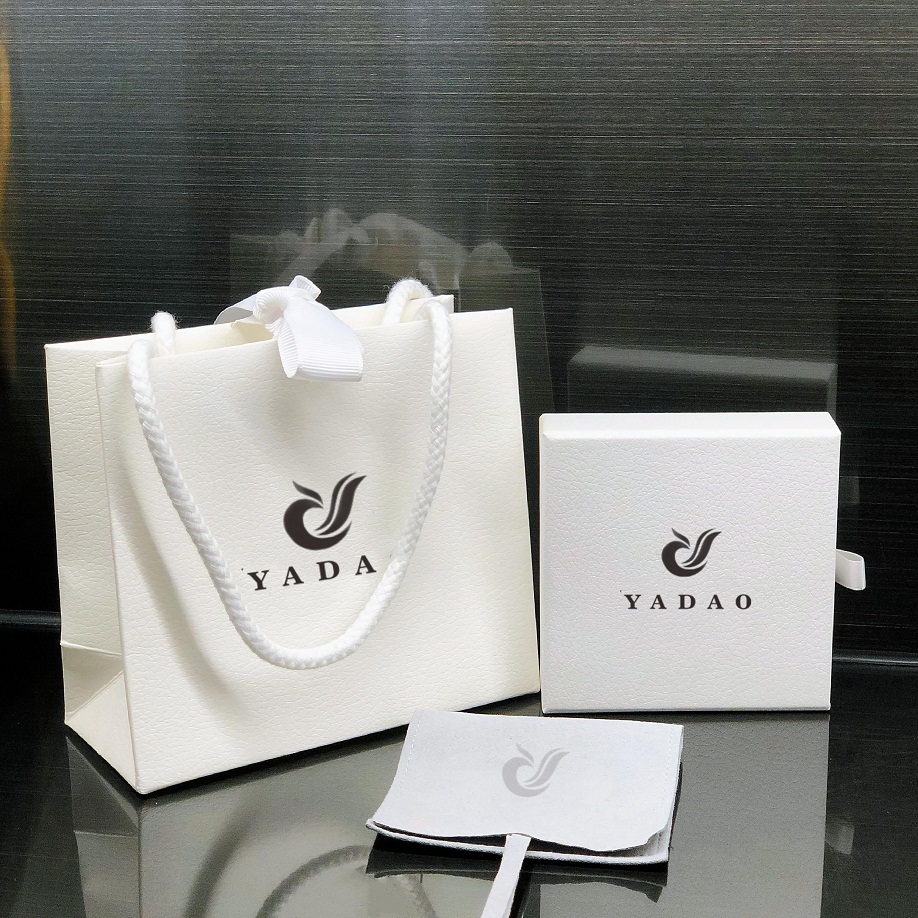 Customized shopping paper bag with cotton rope and ribbon closure white color gift packaging bag