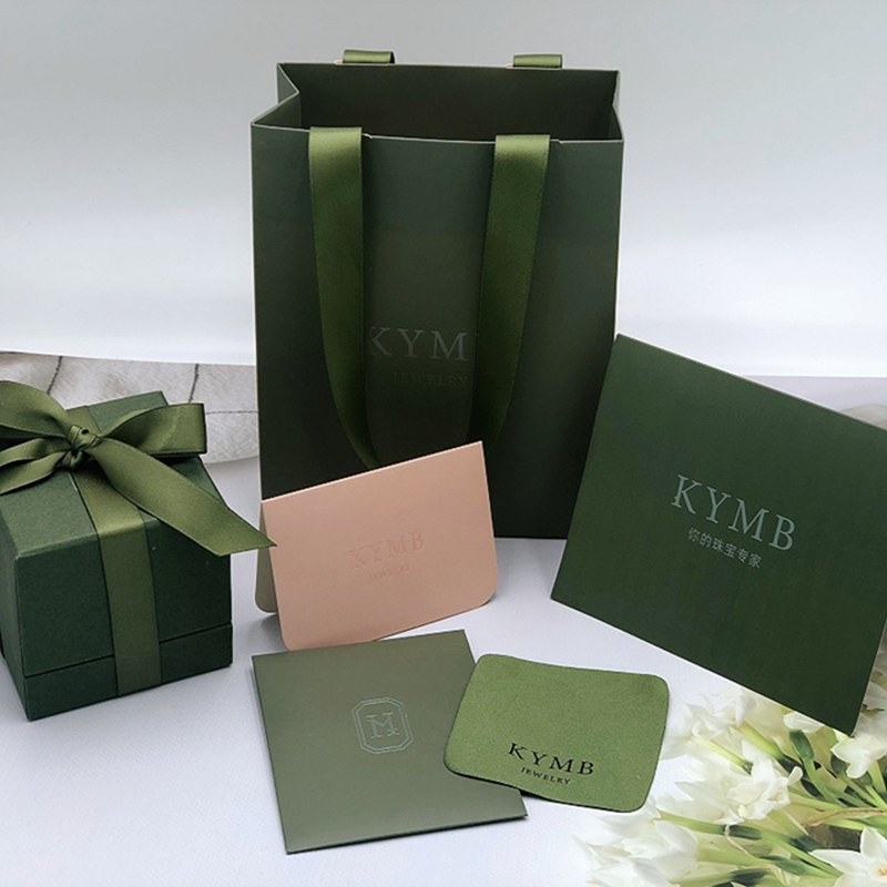Embalaje de joyas de Yadao Establecer caja de papel con inserción de esponja Impresión verde Acabado para la bolsa de papel y la tarjeta