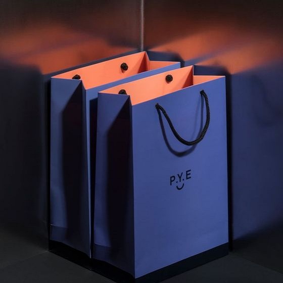 Yadao wholesales design bag gift packaging shopping paper bag with rope handle and blue ribbon on the middle