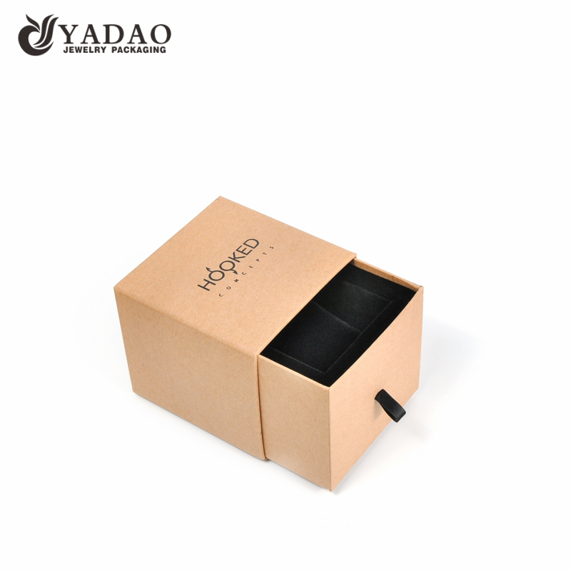 Yellowish cardboard jewellery box drawer style with black pillow insert