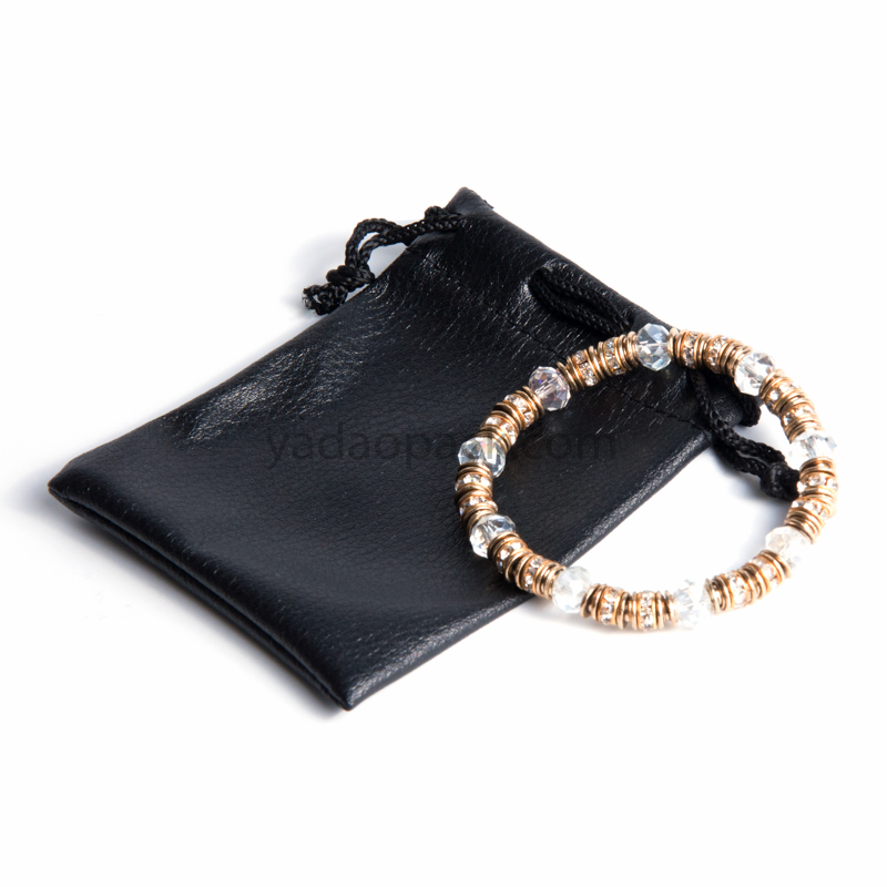 Personnalisez la corde de cordon PU bijoux de bijoux pochette sac en cuir bijoux sac d'emballage pour emballer des pièces de bijoux en toute sécurité en gros en gros