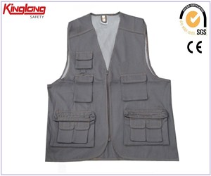 China proveedor 100% chaleco de poliéster de trabajo, chaqueta sin mangas con multipocket