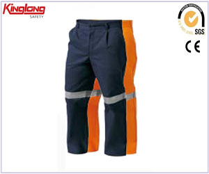 Proveedor de pantalones de trabajo a prueba de polvo de China, pantalones cargo pesados ​​​​con cintas reflectantes