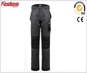 Calças usáveis ​​de segurança de mineração durável, calças uniformes de trabalho com bolsos destacáveis, calças cargo com vários bolsos
