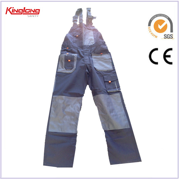 protective painters bibpants,worker full protective painters bibpants,man industrial worker full protective painters bibpants