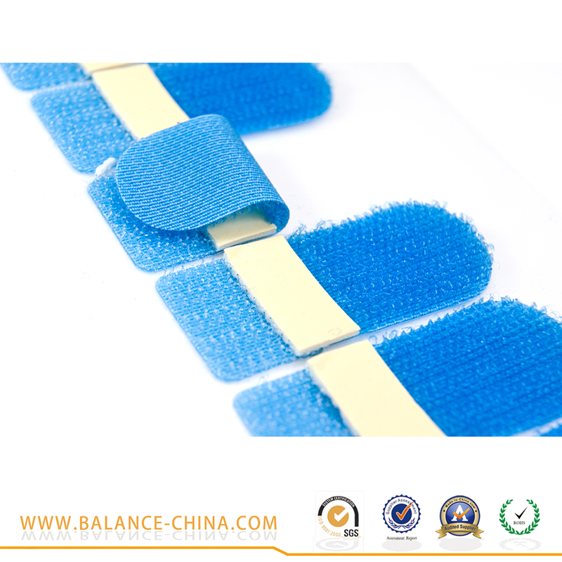 Medical hook and loop tape with back adhesive