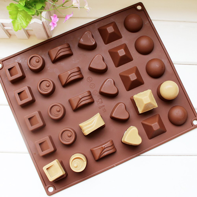 La muffa della gelatina della muffa del cioccolato del silicone su ordinazione della fabbrica, molte forme della muffa del cioccolato