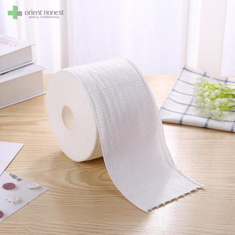 Biodegradable 100%cotton fabric wet and dry use tissue roll for beauty salon
