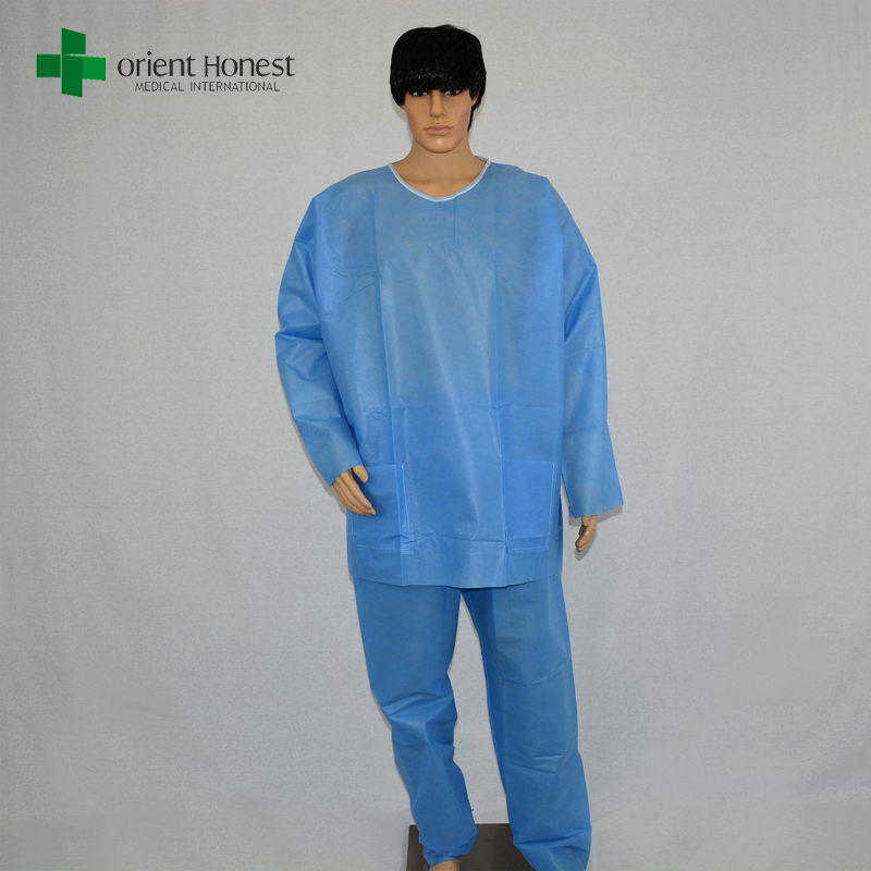 Cina sekali pakai biru pelindung dua sepotong coverall sesuai dengan produsen