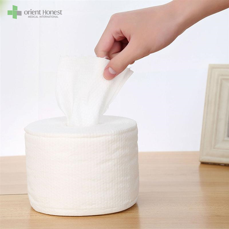 使い捨ての柔らかい綿タオルの乾いて湿式の使用