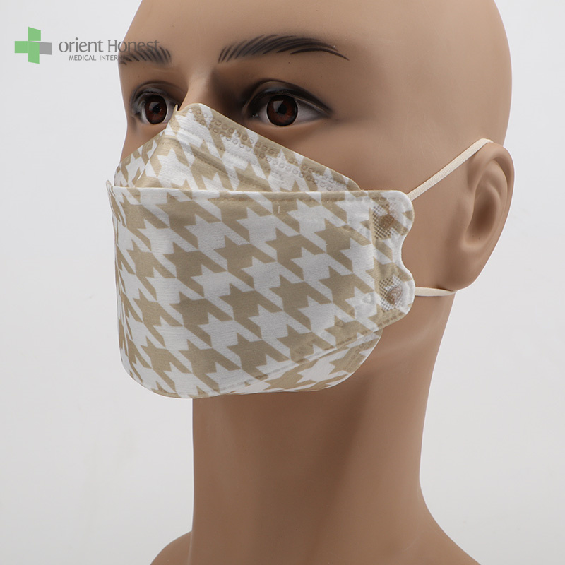 K94 Houndstooth 4ple con máscara facial desechable