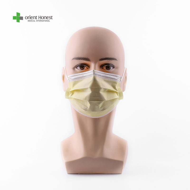 Máscara facial amarela descartável para proteção diária